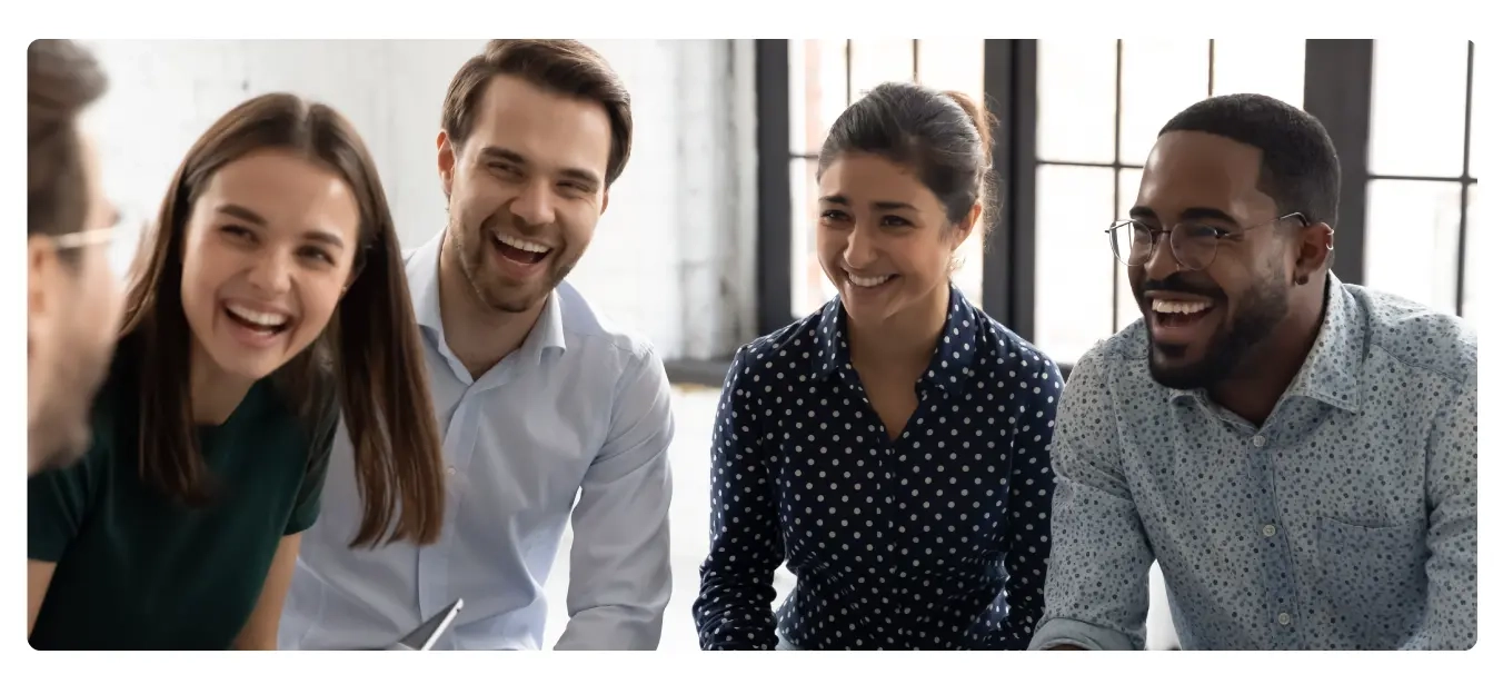 Image of engaged employees that are connected and motivated at work because of Motivosity.