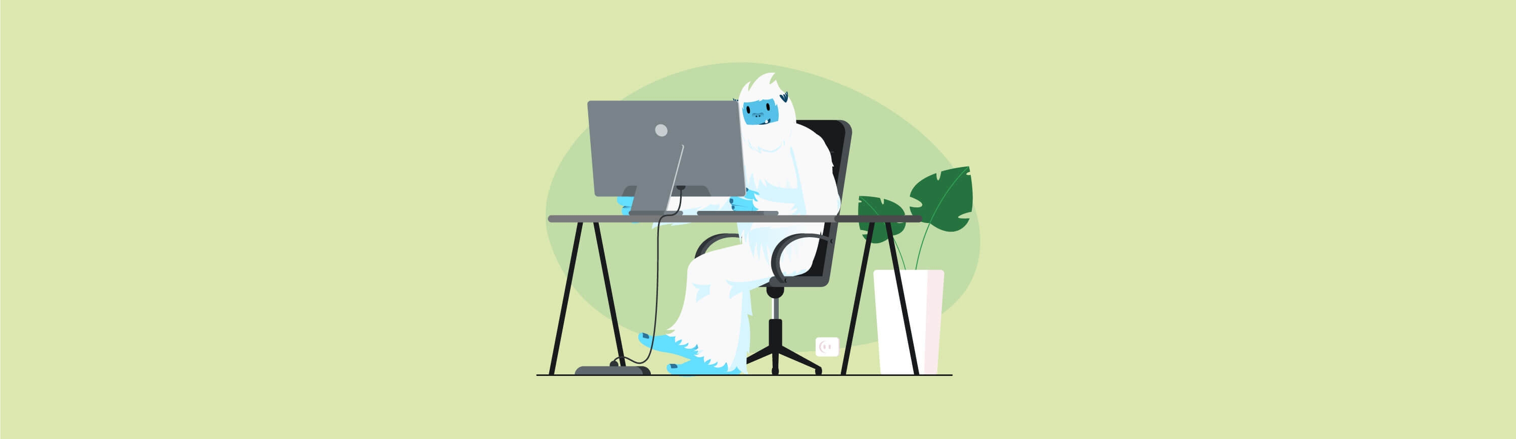 Illustration of Carl the yeti sitting at a desk with a computer, working from home.